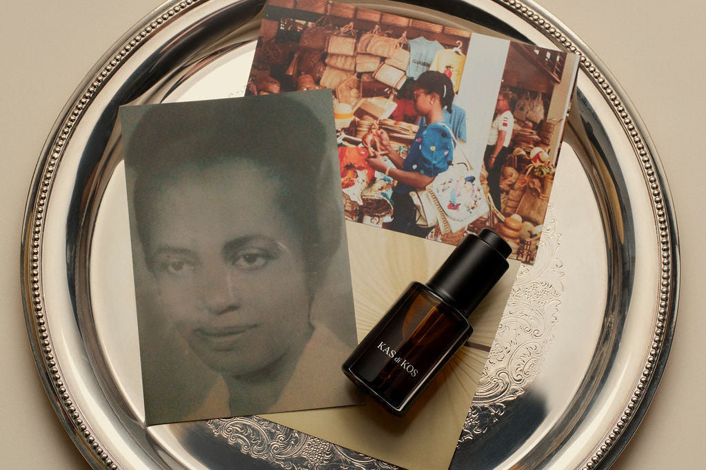 An image representing three generations. A black and white photograph of a grandmother, a color photograph of a mother, and a product created by a daughter, al sitting on a silver platter. The scene is monolithic. 